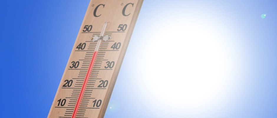 Grafika ilustracyjna przedstawiająca termometr i słońce.